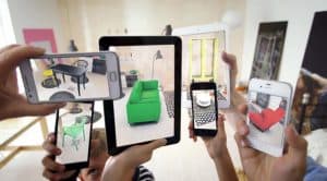 This picture shows an example of what augmented reality is, with several phones displaying virtual items,